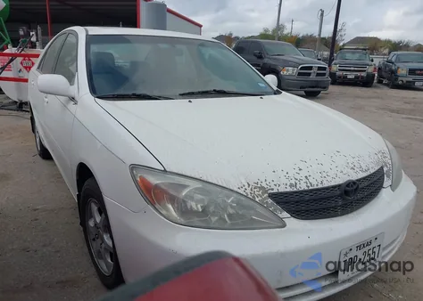 2003 Toyota Camry Le z USA, uszkodzony, nr VIN 4T1BE32K13U254254